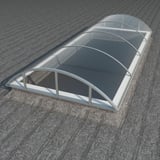Alumon lichtkoepel van helder polycarbonaat 10 mm op een donker plat dak