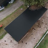 Damwandplaat 20/1100 antracietgrijs als dak van een afdak, dronebeeld