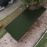 Damwandplaat 20/1100 dak in Chroomoxydegroen op een stalgebouw, bovenaanzicht