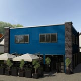 Gebouw met wandbekleding van Gentiaanblauw T20M damwandplaat, zijdelingse zuilen van metselwerk