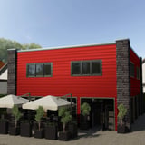 Gebouw met gevelbekleding van damwandplaat T35DR wand Koraalrood RAL 3016