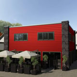 Gebouw met gevelbekleding van damwandplaat T35M Koraalrood RAL 3016