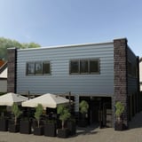 Gebouw met gevelbekleding van damwandplaat T35M wand Pelsgrijs