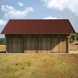 Damwandplaat T45/333MD roodbruin RAL 8012 gemonteerd op een houten schuur, dakzicht