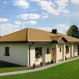 Moderne eengezinswoning met dak van felsdakpaneel PD-510-S in Zandgeel (RAL 1002)