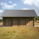 Golfplaat 18/1064 aluminium Zilver-Metallic als dakbedekking op een houten gebouw