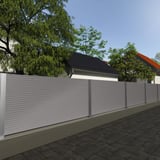 Golfplaat 18/1064 als schuttingbekleding in grijs aluminiumkleurig langs een weg