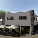 Golfplaat 18/1064 aluminium 0,70 mm, RAL9007, als wandbekleding op een gebouw