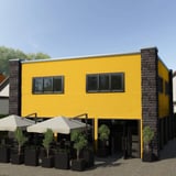 Gebouw met gevel van golfplaat PF25W in Koolzaadgeel, 0,50 mm staal, 25 µm polyestercoating