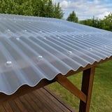 PET golfplaat 76/18, 1,00 mm, lichtblauw getint, als dakbedekking met bevestigingsschroeven op houtconstructie