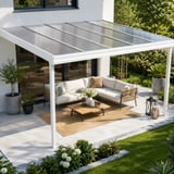 Toepassingsvoorbeeld: terrasoverkapping met heldere polycarbonaat platen van 16 mm en zithoek