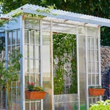 Kas met polycarbonaat dubbelwandige platen 6 mm, helder, beplant met tomaten en bloembakken