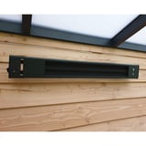 Verwarming aluminium zwart, gemonteerd aan houten wand, licht van voren