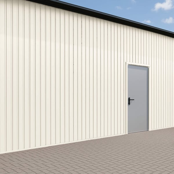 Damwandplaat T7M wand, Zuiverwit RAL 9010, 0,75 mm staal, verticaal gemonteerd op een gebouwwand