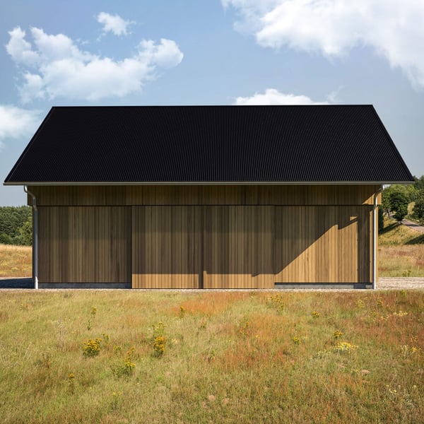 Golfplaat 18/1064 zwart mat op een houten gebouw als dakbedekking