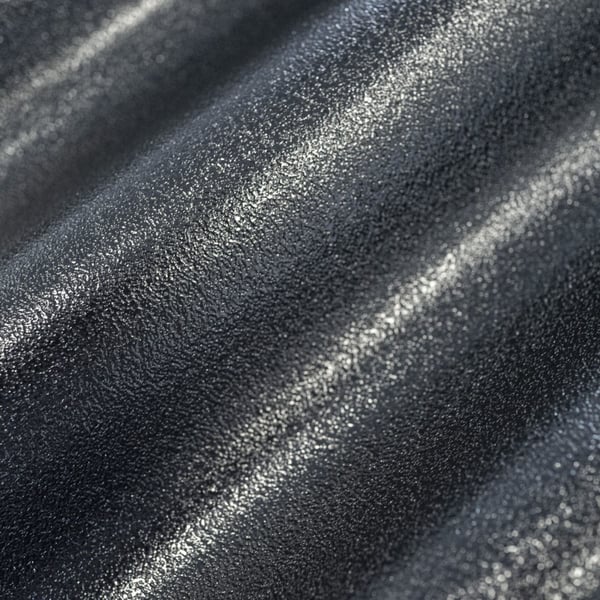 Detail van het zwarte, gestructureerde oppervlak van de ReWell profielplaat 94/34